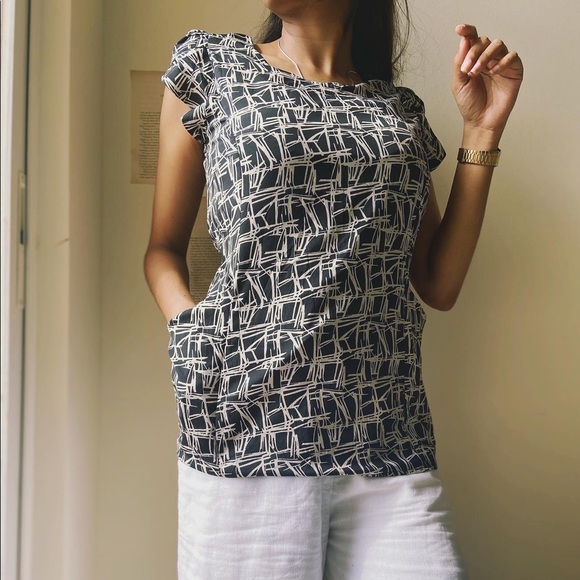 Top in black and white print.